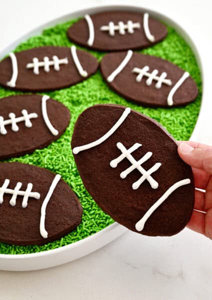 Chocolate football cookies with royal icing laces.